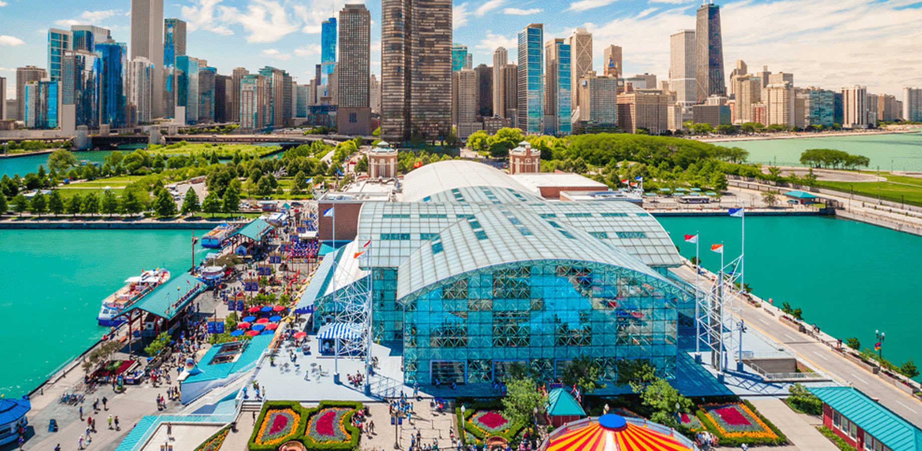 Aerial view of Navy Pier with the city skyline in the background.